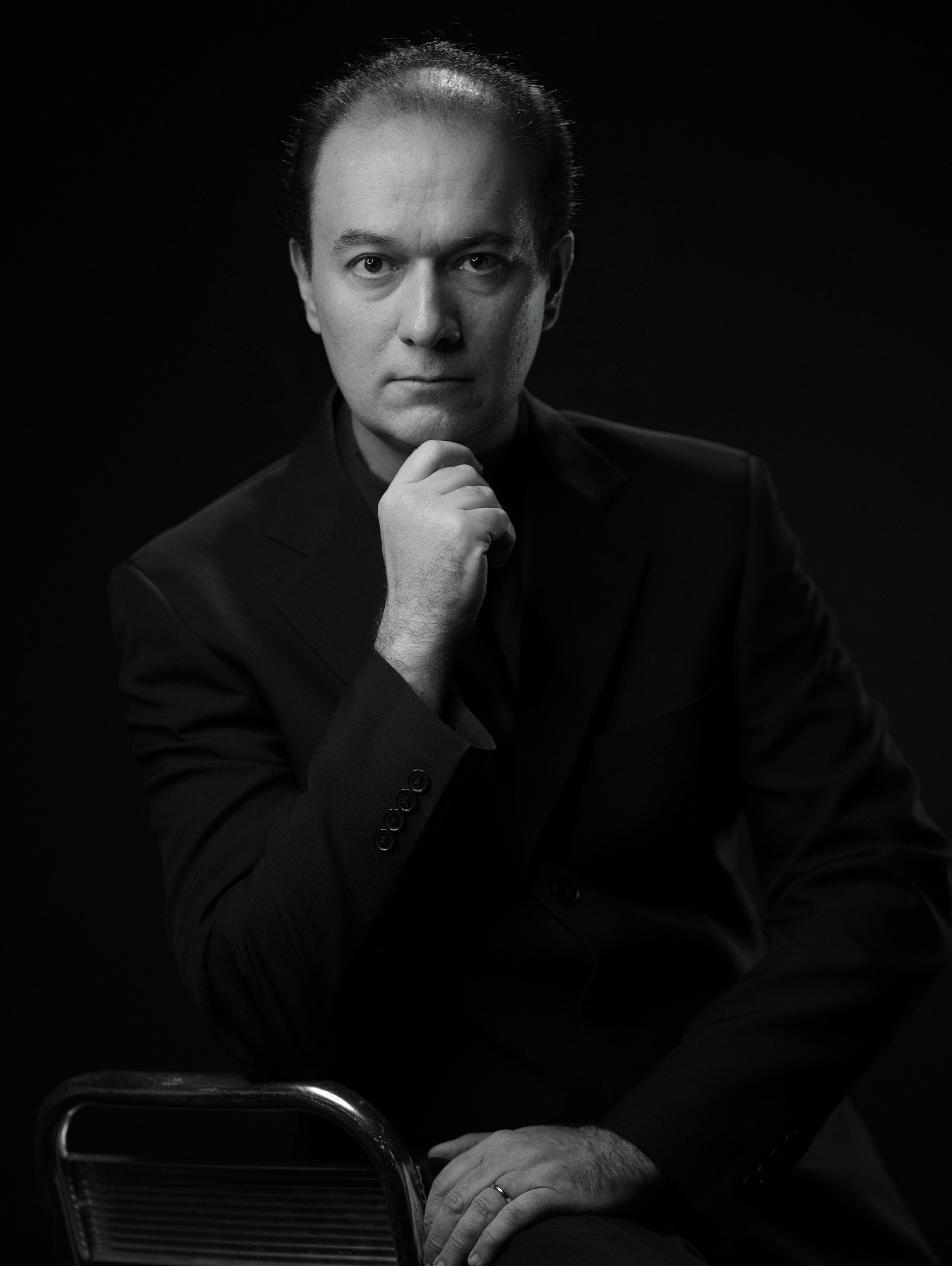 Retrato profissional do Dr. Paulo Belluco, alergista e imunologista